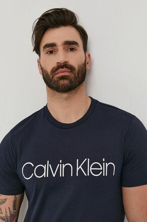 Calvin Klein T-shirt - mornarsko modra. T-shirt iz zbirke Calvin Klein. Model narejen iz tanka