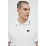 Polo Helly Hansen moški, bela barva - bela. Polo iz kolekcije Helly Hansen, izdelan iz tanke, elastične pletenine. Material z optimalno elastičnostjo zagotavlja popolno svobodo gibanja.