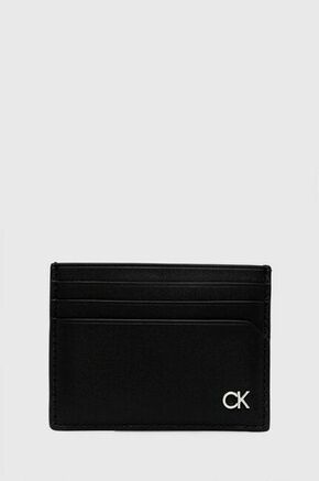 Usnjen etui za kartice Calvin Klein črna barva - črna. Etui za kartice iz kolekcije Calvin Klein. Model izdelan iz naravnega usnja. Model je enostaven za čiščenje in vzdrževanje.