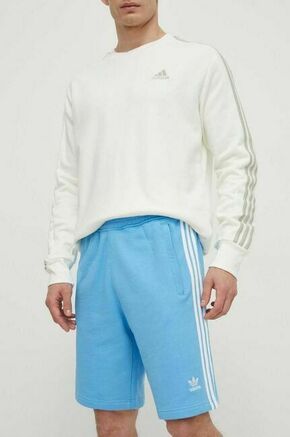 Bombažne kratke hlače adidas Originals IR8008 - modra. Kratke hlače iz kolekcije adidas Originals. Model izdelan iz pletenine. Model iz izjemno udobne bombažne tkanine.