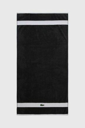 Bombažna brisača Lacoste L Casual Bitume 70 x 140 cm - siva. Brisača iz kolekcije Lacoste. Model izdelan iz bombažne tkanine.