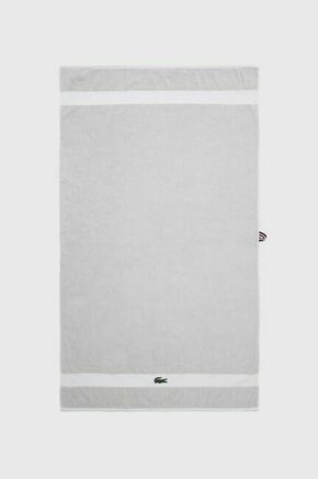 Brisača Lacoste L Casual Argent 90 x 150 cm - bež. Brisača iz kolekcije Lacoste. Model izdelan iz bombažne tkanine.