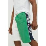 Kratke hlače Tommy Jeans moški, zelena barva - zelena. Kratke hlače iz kolekcije Tommy Jeans. Model izdelan iz tkanine. Lahek material, namenjen za toplejše letne čase.