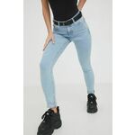 Kavbojke Tommy Jeans ženski - modra. Kavbojke iz kolekcije Tommy Jeans skinny kroja, z normalnim pasom. Model izdelan iz elastičnega denima.