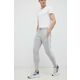 Hlače za vadbo adidas Essentials siva barva - siva. Hlače za vadbo iz kolekcije adidas. Model izdelan iz materiala, ki odvaja vlago.