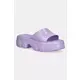 Natikači Melissa MELISSA ELLA SLIDE AD - vijolična. Natikači iz kolekcije Melissa. Model je izdelan iz sintetičnega materiala. Idealno za bazen, plažo ali sprehode.