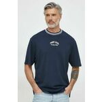 Bombažna kratka majica Tommy Jeans moški, mornarsko modra barva - mornarsko modra. Ohlapna kratka majica iz kolekcije Tommy Jeans, izdelana iz pletenine, prijetne na otip. Model iz visokokakovostnega in trajnostnega materiala.