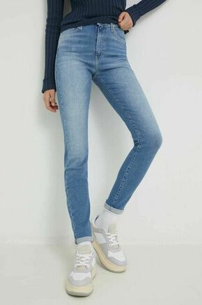 Kavbojke Tommy Jeans Sylvia ženski - modra. Kavbojke iz kolekcije Tommy Jeans v stilu super skinny z visokim pasom. Model izdelan iz zelo prilagodljivega in udobnega denima.