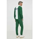 Trenirka Lacoste moški, zelena barva - zelena. Komplet trenirke iz kolekcije Lacoste. Model izdelan iz vzorčaste tkanine. Lahek, izjemno trpežen material.