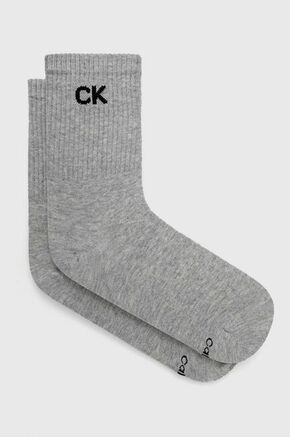 Calvin Klein nogavice - siva. Dolge nogavice iz zbirke Calvin Klein. Model iz elastičnega