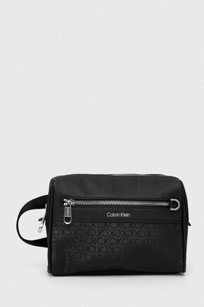 Kozmetična torbica Calvin Klein črna barva - črna. Majhna kozmetična torbica iz kolekcije Calvin Klein. Model izdelan iz kombinacije tekstilnega materiala in ekološkega usnja.