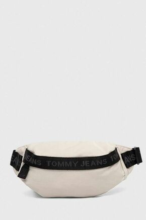 Torbica za okoli pasu Tommy Jeans bež barva - bež. Pasna torbica iz kolekcije Tommy Jeans. Model izdelan iz tekstilnega materiala.
