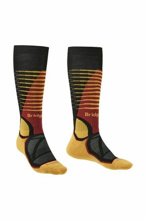 Smučarske nogavice Bridgedale Midweight Merino Performance - rumena. Smučarske nogavice iz kolekcije Bridgedale. Model izdelan iz termoaktivnega materiala z merino volno.