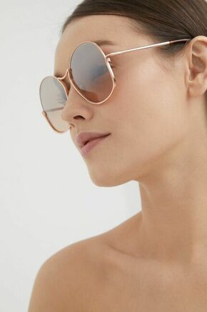 Sončna očala Max Mara žensko - rjava. Sončna očala iz kolekcije Max Mara. Model s enobarvnimi stekli in okvirji iz kovine. Ima filter UV 400.