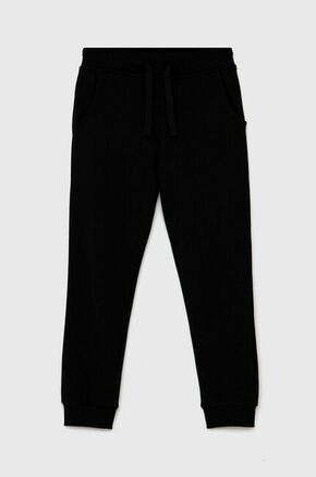 Otroške hlače Guess - črna. Hlače iz kolekcije Guess. Model izdelan iz pletenini.