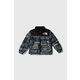 Otroška puhovka The North Face 1996 RETRO NUPTSE JACKET bež barva - črna. Otroška jakna iz kolekcije The North Face. Podložen model, izdelan iz vzorčastega materiala. Model s polnilom iz naravnega puha in perja zagotavlja visoko stopnjo izolacije...