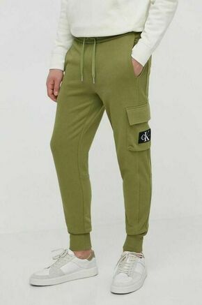 Bombažen spodnji del trenirke Calvin Klein Jeans zelena barva - zelena. Spodnji del trenirke iz kolekcije Calvin Klein Jeans. Model izdelan iz elastične pletenine. Model iz izjemno udobne bombažne tkanine.
