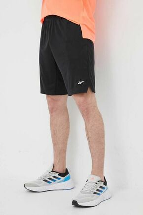 Kratke hlače za vadbo Reebok Comm črna barva - črna. Kratke hlače za vadbo iz kolekcije Reebok. Model izdelan iz recikliranega materiala