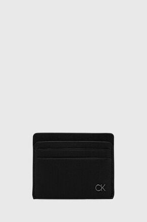 Usnjen etui za kartice Calvin Klein črna barva - črna. Etui za kartice iz kolekcije Calvin Klein. Model izdelan iz naravnega usnja.