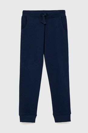 Otroške hlače Guess - mornarsko modra. Hlače iz kolekcije Guess. Model izdelan iz pletenini.