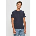 Tommy Jeans t-shirt - mornarsko modra. T-shirt iz kolekcije Tommy Jeans. Model izdelan iz rahlo elastične pletenine.