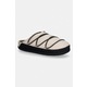 Copati Moon Boot MB SOFT SLIPPER - bež. Copati iz kolekcije Moon Boot, izdelani iz kombinacije tekstilnega in sintetičnega materiala. Model z gumijastim podplatom, ki je trpežen in odporen na poškodbe.