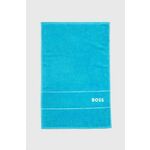 Bombažna brisača BOSS Plain River Blue 40 x 60 cm - modra. Brisača iz kolekcije BOSS. Model izdelan iz bombažne tkanine.