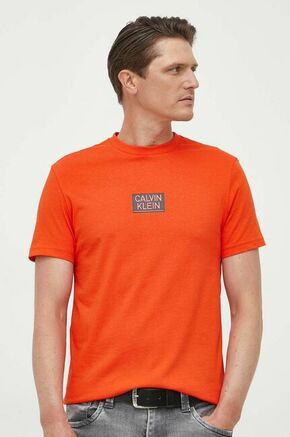 Bombažna kratka majica Calvin Klein oranžna barva - oranžna. Kratka majica iz kolekcije Calvin Klein