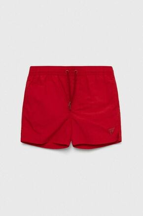 Otroške kopalne kratke hlače Guess rdeča barva - rdeča. Otroški kopalne kratke hlače iz kolekcije Guess. Model izdelan iz enobarvnega materiala.