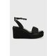 Sandali Calvin Klein WEDGE 50HH W/HW - JQ ženski, črna barva, HW0HW01490 - črna. Sandali iz kolekcije Calvin Klein. Model izdelan iz kombinacije tekstilnega materiala in naravnega usnja. Model z mehkim, oblikovanim vložkom zagotavlja udobje.
