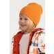 Otroška dvostranska kapa Coccodrillo oranžna barva - oranžna. Otroški kapa iz kolekcije Coccodrillo. Model izdelan iz vzorčaste pletenine.