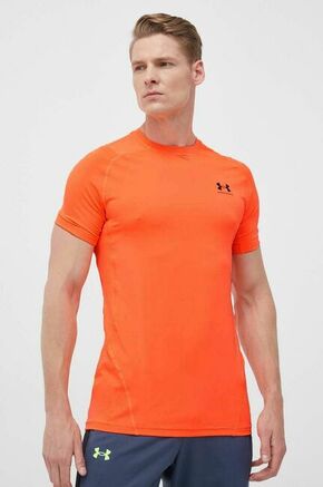 Kratka majica za vadbo Under Armour črna barva - oranžna. Kratka majica za vadbo iz kolekcije Under Armour. Model izdelan iz materiala