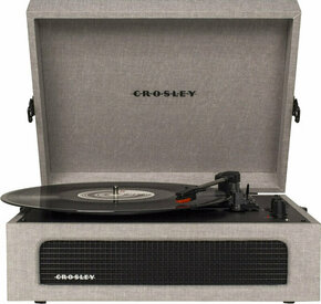 Gramofon v kovčku Crosley Voyager - siva. Gramofon v kovčku iz kolekcije Crosley. Model izdelan iz MDF plošče in umetne snovi.