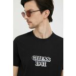 Bombažna kratka majica Guess črna barva - črna. Kratka majica iz kolekcije Guess. Model izdelan iz pletenine z nalepko. Tanek, gosto pleten material.