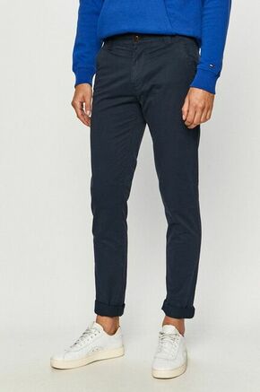 Tommy Jeans hlače - mornarsko modra. Hlače iz kolekcije Tommy Jeans. Model izdelan iz enobarvne tkanine.