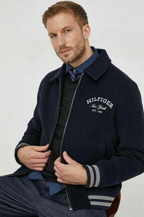 Volnena jakna Tommy Hilfiger mornarsko modra barva - mornarsko modra. Jakna iz kolekcije Tommy Hilfiger. Prehoden model