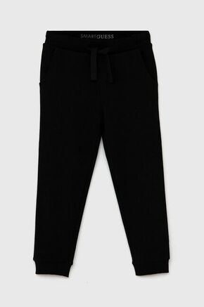 Otroške hlače Guess - črna. Hlače iz kolekcije Guess. Model izdelan iz enobarvne pletenine.