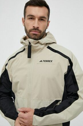 Outdoor jakna adidas TERREX Utilitas bež barva - bež. Outdoor jakna iz kolekcije adidas TERREX. Nepodložen model