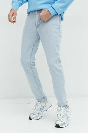 Kavbojke Tommy Jeans Simon moške - modra. Kavbojke iz kolekcije Tommy Jeans v kroju skinny z normalnim pasom. Model izdelan iz spranega denima. Izjemno udoben material.