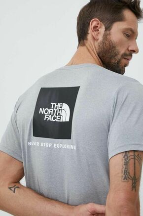 Športna kratka majica The North Face Reaxion siva barva - siva. Športna kratka majica iz kolekcije The North Face. Model izdelan iz materiala