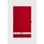 Bombažna brisača Lacoste L Casual Rouge 55 x 100 cm - rdeča. Brisača iz kolekcije Lacoste. Model izdelan iz vzorčaste tkanine.