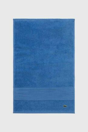 Bombažna brisača Lacoste L Lecroco Aérien 40 x 60 cm - modra. Brisača iz kolekcije Lacoste. Model izdelan iz bombažne tkanine.