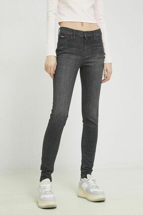 Kavbojke Tommy Jeans ženski - siva. Kavbojke iz kolekcije Tommy Jeans v stilu skinny s normalnim pasom. Model izdelan iz elastičnega denima.