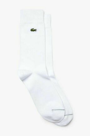 Nogavice Lacoste RA4264 bela barva - bela. Nogavice iz kolekcije Lacoste. Model izdelan iz enobarvnega materiala.