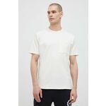 Bombažna kratka majica New Balance bež barva - bež. Kratka majica iz kolekcije New Balance. Model izdelan iz enobarvne pletenine. Izjemno udoben material, izdelan iz naravnih vlaken.
