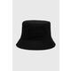 Dvostranski bombažen klobuk Calvin Klein črna barva - črna. Klobuk iz kolekcije Calvin Klein. Model z ozkim robom, izdelan iz materiala z nalepko. Izdelek s posebnim dizajnom, ki omogoča dvostransko uporabo.