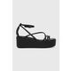 Usnjeni sandali Calvin Klein WEDGE SANDAL 30 LTH ženski, črna barva, HW0HW01949 - črna. Sandali iz kolekcije Calvin Klein. Model je izdelan iz naravnega usnja. Model z mehkim, oblikovanim vložkom zagotavlja udobje.