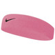 Trak za lase Nike roza barva - roza. Trak iz kolekcije Nike. Model izdelan iz debele pletenine.