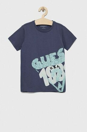 Otroška bombažna kratka majica Guess - modra. Otroške lahkotna kratka majica iz kolekcije Guess. Model izdelan iz tanke