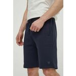 Kratke hlače Guess moški, bež barva - mornarsko modra. Kratke hlače iz kolekcije Guess. Model izdelan iz prožnega materiala, ki zagotavlja udobje in svobodo gibanja. Lahek in udoben model, idealen za vsakodnevno nošenje.
